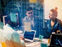 Entrepreneur using AI tools on laptop for productivity workflow | AI tools for small business productivity